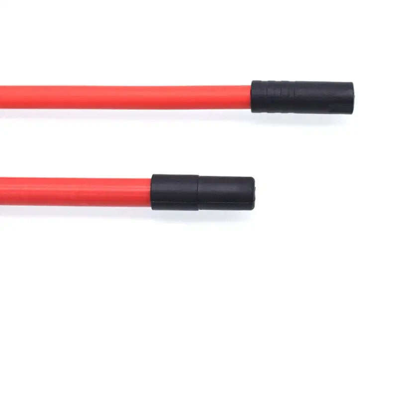 two red and black plastic cable ends