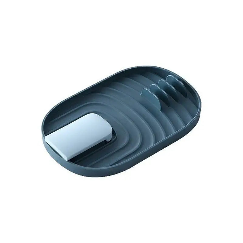 the black plastic soap dish with a white lid
