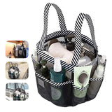 a black and white striped bag with a lot of items inside