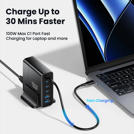 Multi-port USB-C charging hub connected to a laptop for fast charging.