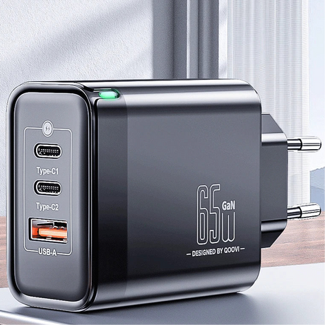 Multi-port USB charger adapter with two USB-C ports and one USB-A port.