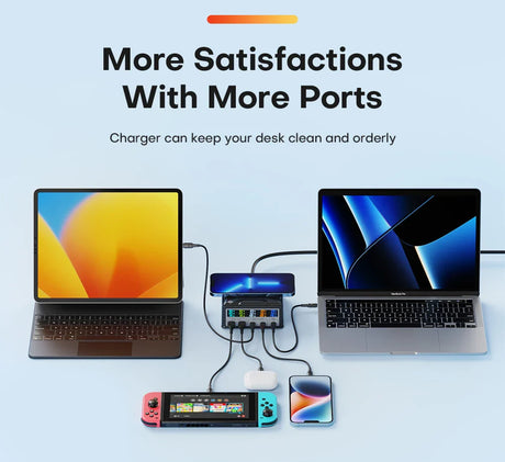 Multi-port USB charging hub connected to various electronic devices including laptops, a smartphone, and a gaming console.