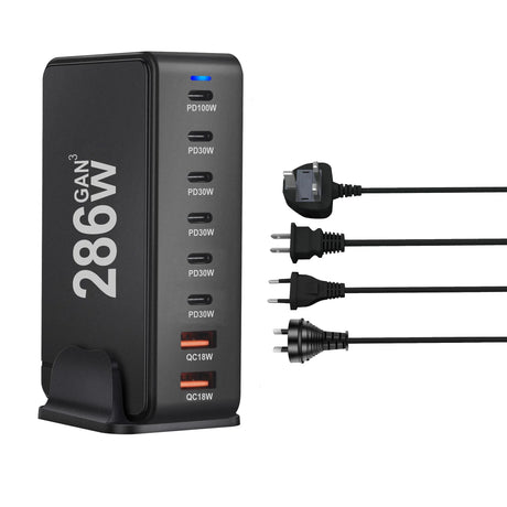 Multi-port USB charging station with various power outputs and interchangeable plugs.