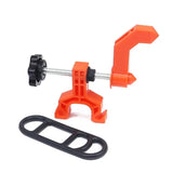 a pair of orange plastic clamps with a black plastic clamp