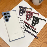 Multiple colored camera lens protectors for a Samsung phone.