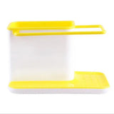 a yellow plastic container with a white lid