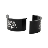 a pair of black cuff bracelets with white lettering
