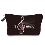 a black cosmetic bag with music notes and a red heart