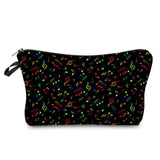 a black cosmetic bag with colorful music notes