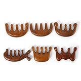 a set of four wooden hair clips