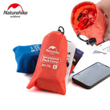 someone is holding a phone and a pack of items in a bag