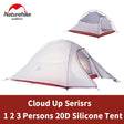 a close up of a tent with a red and white tent