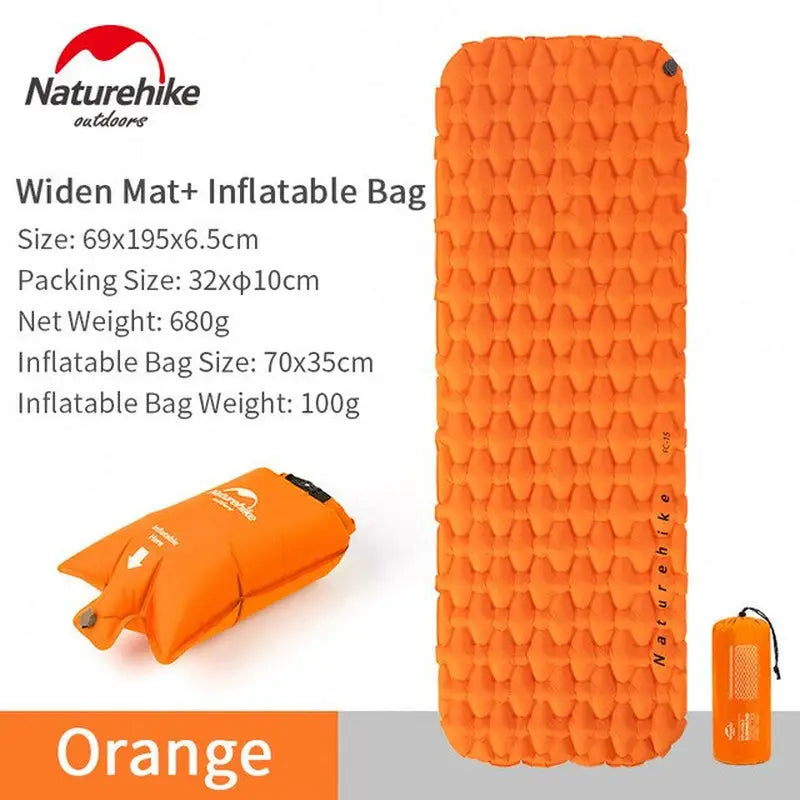 a close up of a sleeping pad with a bag and orange bag