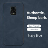 the back of a navy blue samsung phone case with the text, ` `,’’,’’