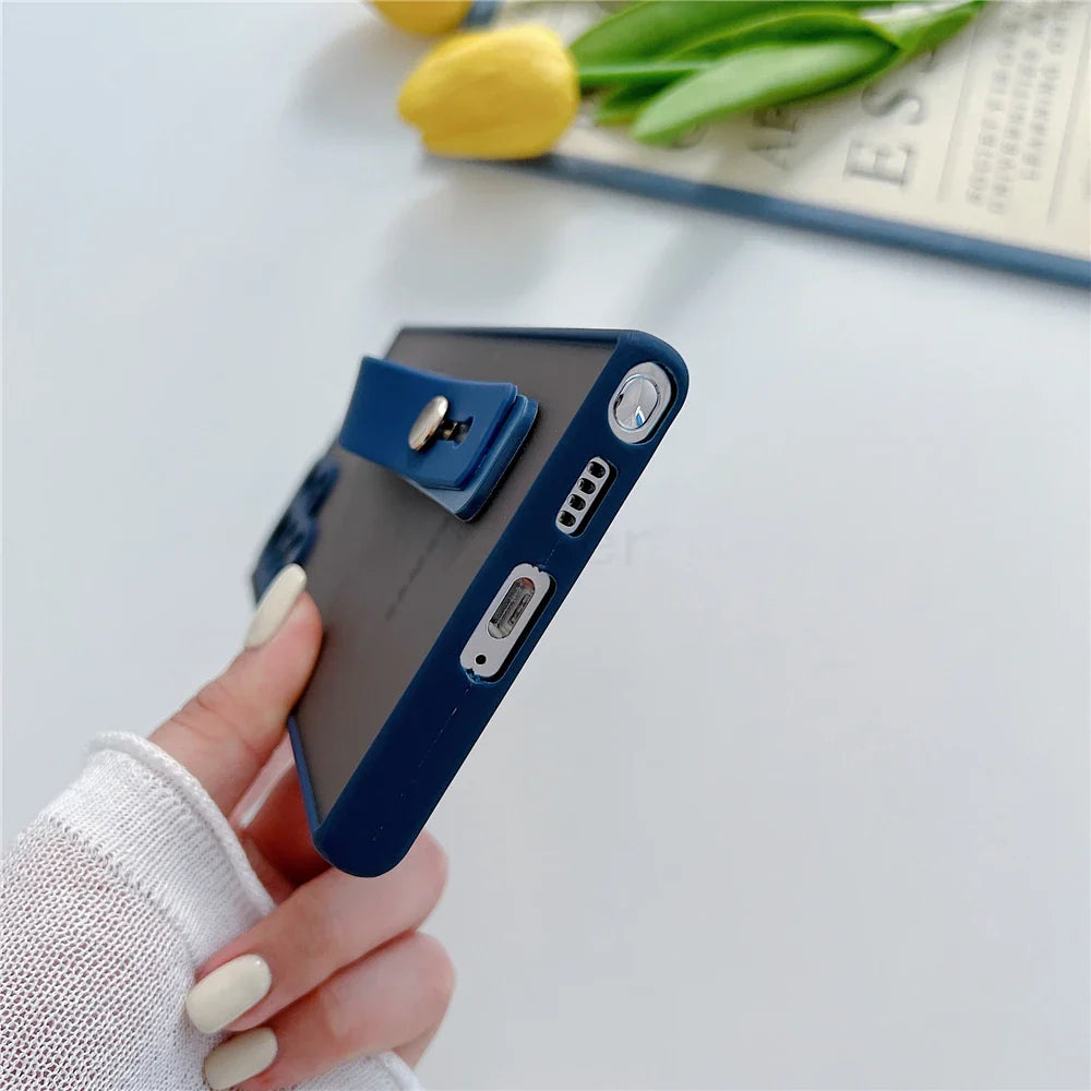 A navy blue phone case with a built-in kickstand.