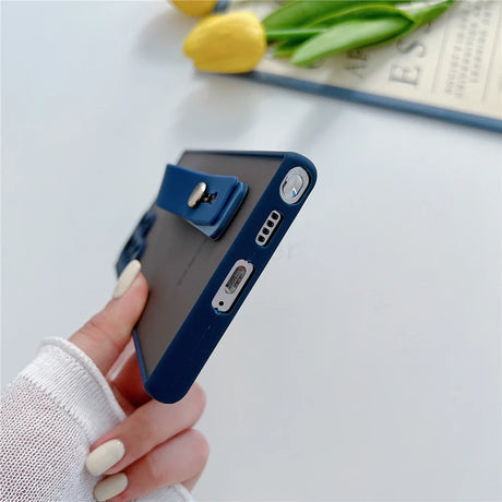 A navy blue phone case with a built-in kickstand.
