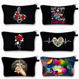 a set of four makeup bags with different designs