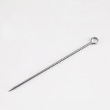 a metal needle on a white background