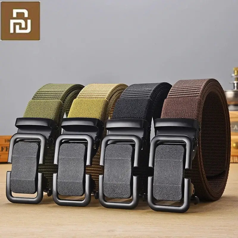 a close up of a group of belts on a table