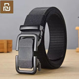 a black belt with a buckle on it