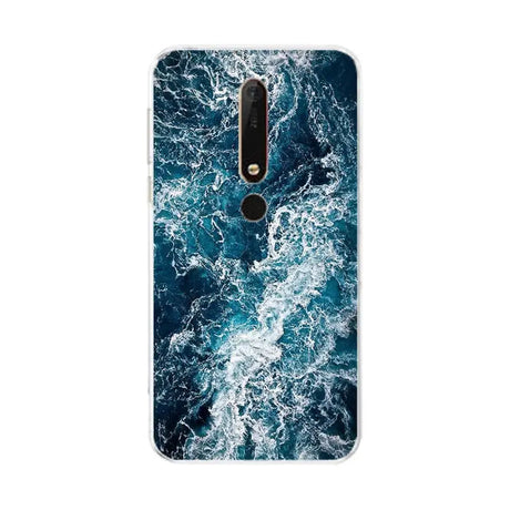 the ocean waves printed on the back of a nokia phone case