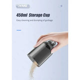 the oxi - e 450ml storage cup is being held over a hand