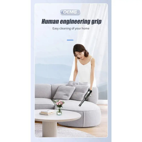 a woman vacuuming a couch with a vacuum cleaner