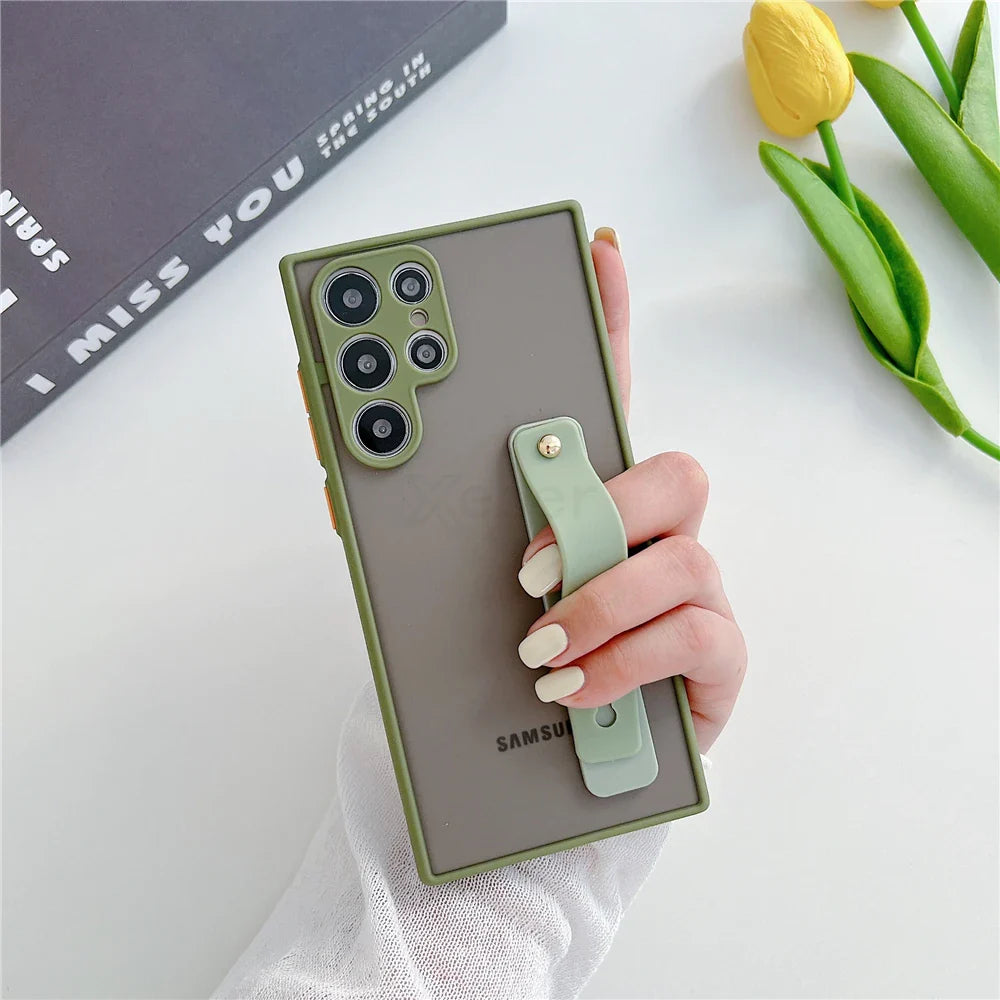 Olive green phone case with a built-in strap.