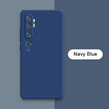 the back of a blue oneplar phone with the text navy blue