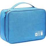 the blue travel case is shown with a white logo on it