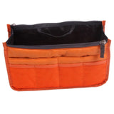 the orange and black organizer bag is open