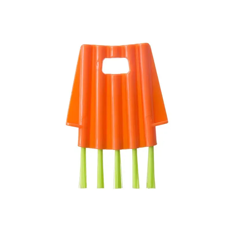a plastic orange chair with green legs