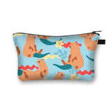 a blue and orange pouch bag with a pattern of dogs