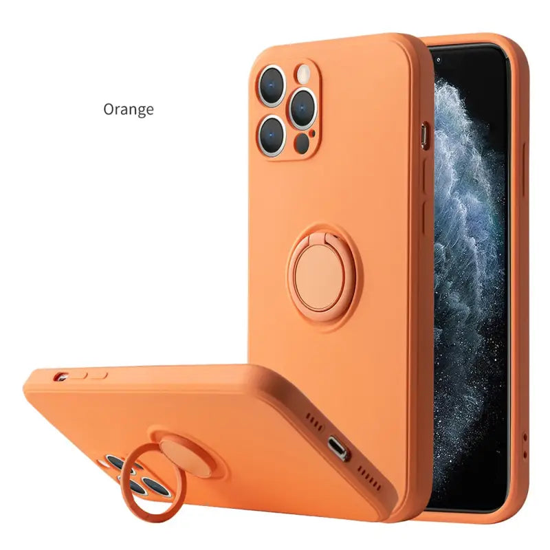 an orange iphone case with a ring on the back