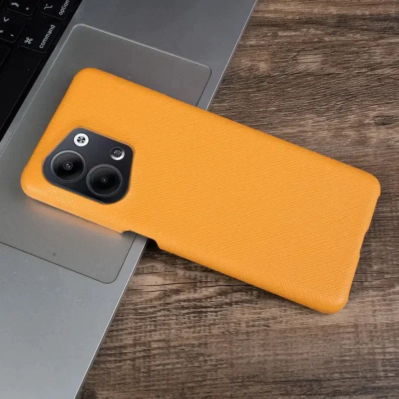 the case is made from a soft, yellow leather