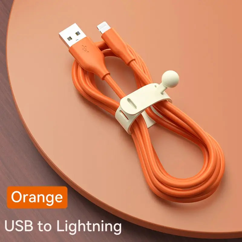 an orange usb cable with a white cord