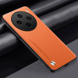 Orange smartphone with a circular quad-camera setup on the back.