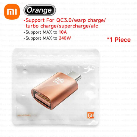 an orange charger with a cable attached to it