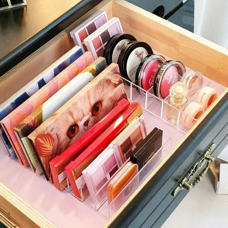 a drawer with makeup products in it