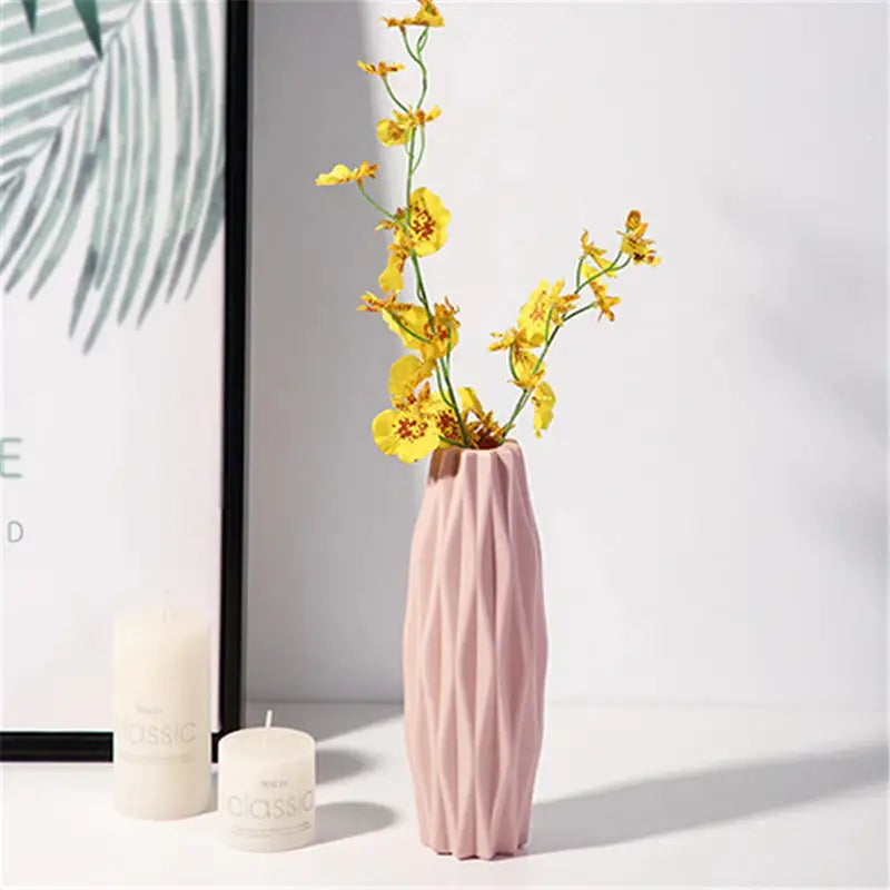 a vase with yellow flowers in it
