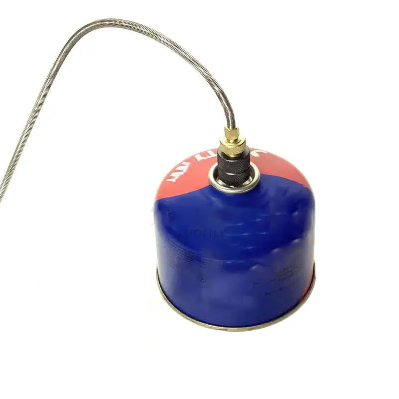 a blue and red gas canister with a metal handle