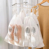 three clear bags hanging on a clothes rack