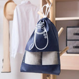 a bag hanging on a wooden rack