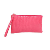 the pink crocodile clutch bag