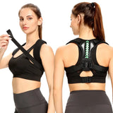 arafed woman in a black sports bra top holding a black object