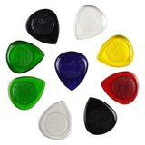 a set of six different colored glass guitar picks