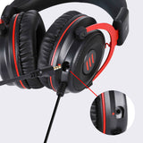 Over-ear headphones with black and red color scheme featuring a detachable audio cable.