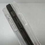 packaging of a black pen in a clear box on a white surface