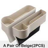 a pair of beige plastic storage boxes with a black bottom