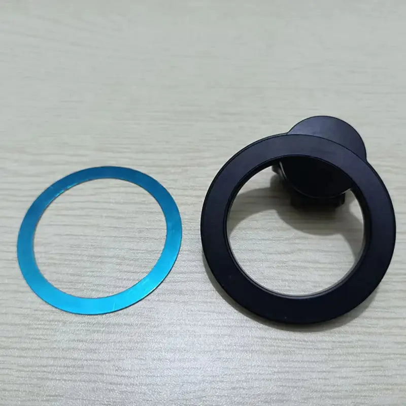 a pair of black and blue metal rings